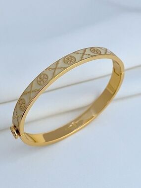 Tory Burch Gold and Cream Enamel Logo Bangle Bracelet
